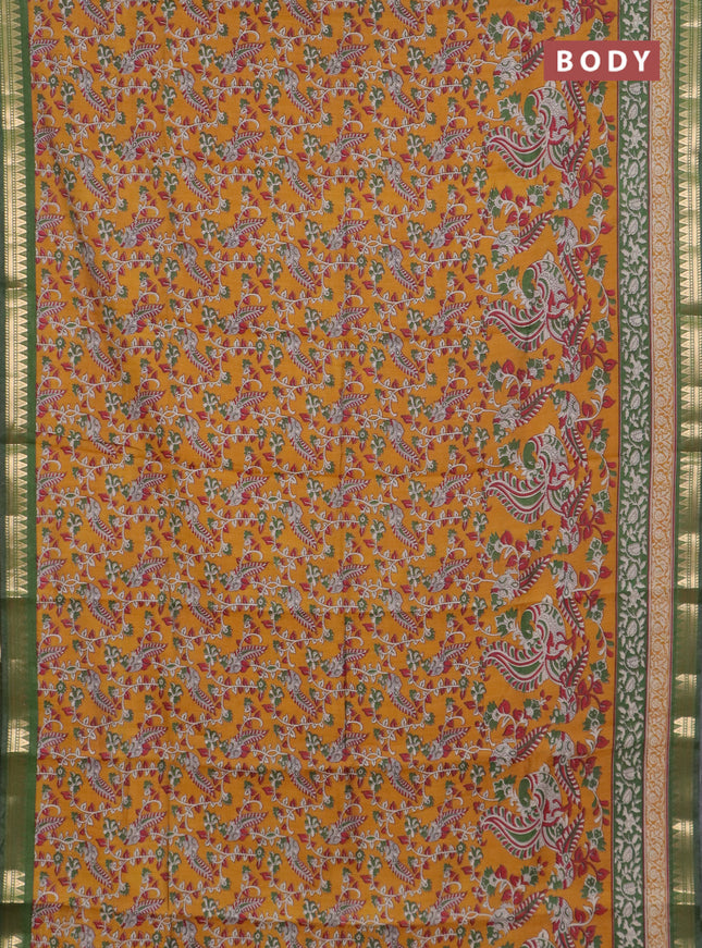 Semi maheswari cotton saree dark mustard and sap green with allover kalamkari prints and zari wovem border