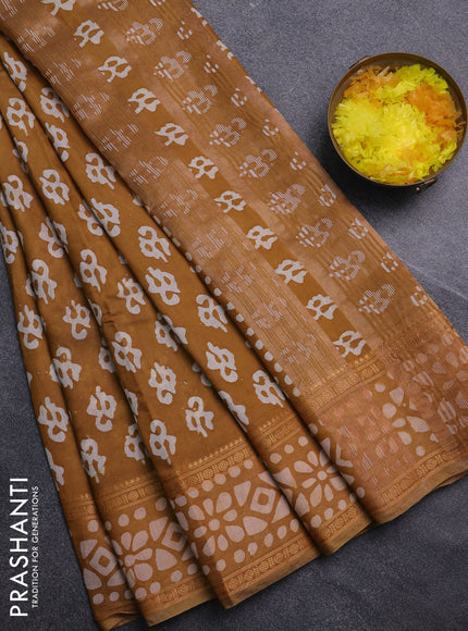 Semi maheswari cotton saree dark mustard with allover batik prints and rettapet printed border