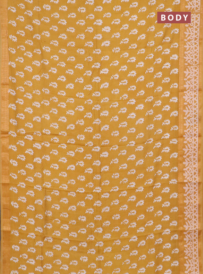 Semi maheswari cotton saree mustard yellow with allover batik prints and rettapet printed border
