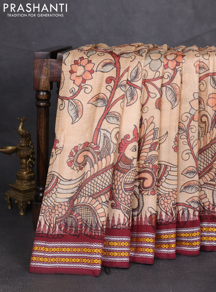 Pure tussar silk saree pale orange and maroon with allover kalamkari prints and temple design vidharba border