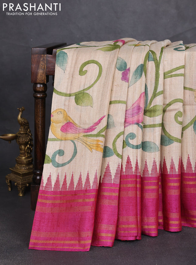 Pure tussar silk saree beige and magenta pink with allover kalamkari hand painted prints and temple design rettatpet zari woven border
