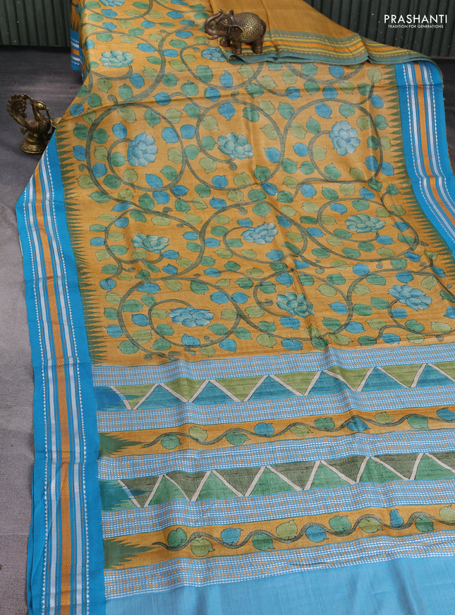 Pure tussar silk saree mustard shade and cs blue with allover kalamkari hand painted prints and temple design virdharbha border