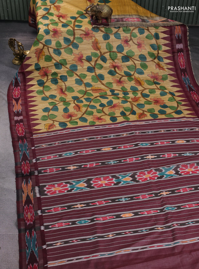 Pure tussar silk saree sandal and maroon with allover kalamkari hand painted prints and temple design zari woven ikat border