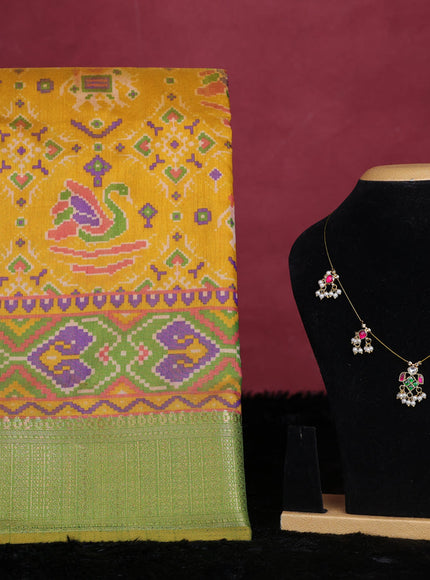 Yellow and green semi tussar saree with matching Neck piece