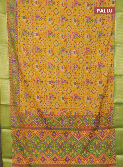 Yellow and green semi tussar saree with matching Neck piece