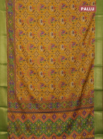 Yellow and green semi tussar saree with matching Neck piece