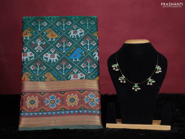 Bottle green semi tussar saree with matching Neck piece