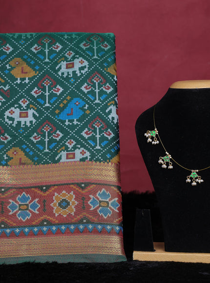 Bottle green semi tussar saree with matching Neck piece