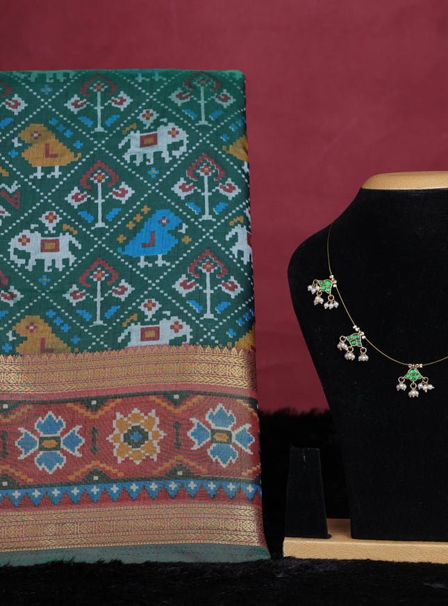 Bottle green semi tussar saree with matching Neck piece