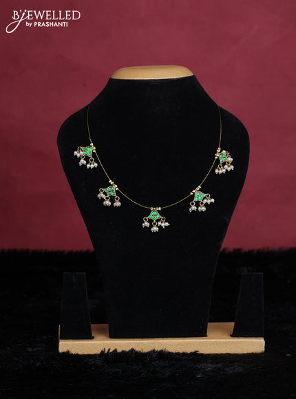 Bottle green semi tussar saree with matching Neck piece