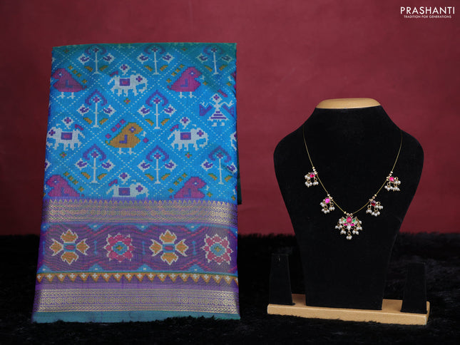 Teal blue semi tussar saree with matching Neck piece