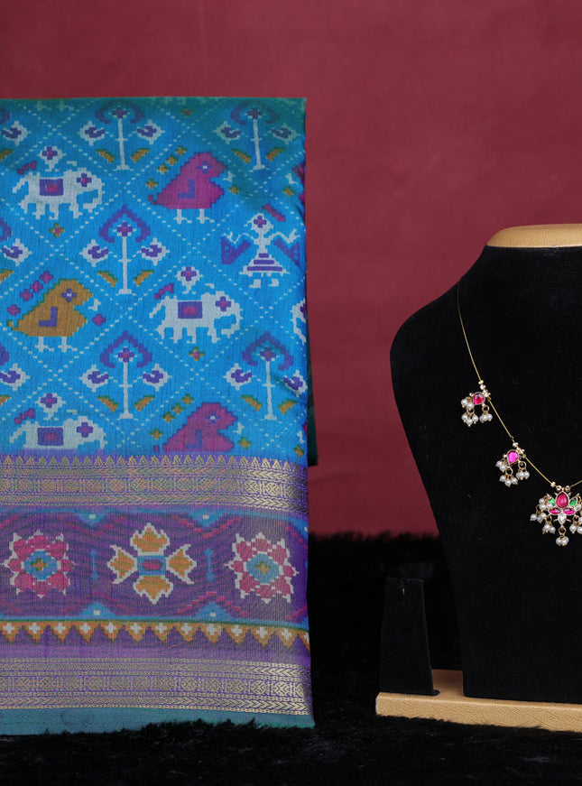 Teal blue semi tussar saree with matching Neck piece