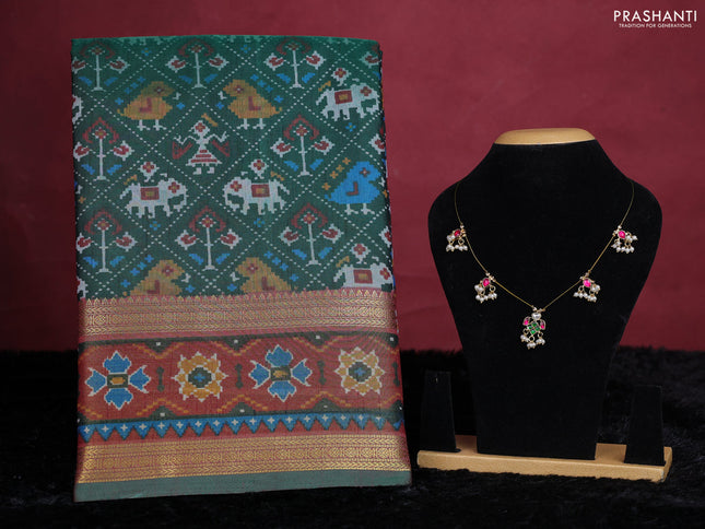 Bottle green semi tussar saree with matching Neck piece