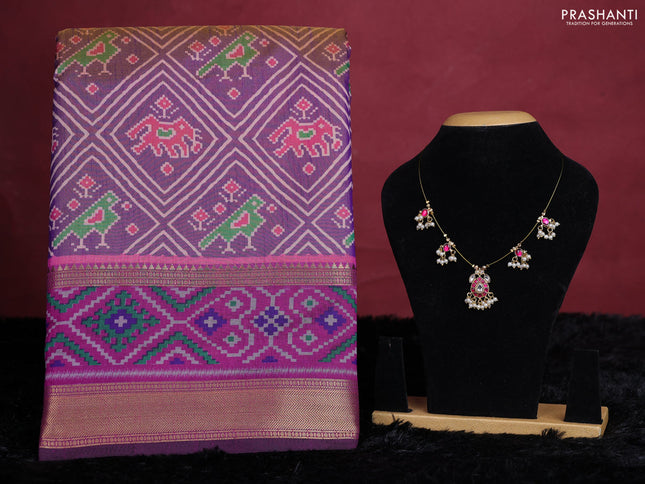Purple shade semi tussar saree with matching Neck piece