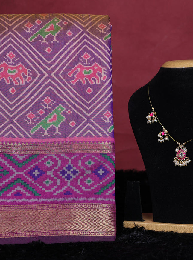 Purple shade semi tussar saree with matching Neck piece