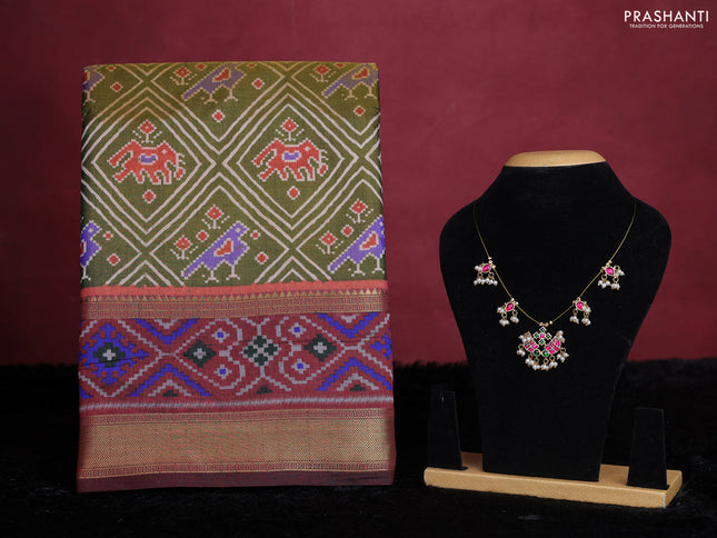 Mehendi green semi tussar saree with matching Neck piece