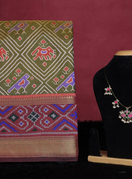 Mehendi green semi tussar saree with matching Neck piece