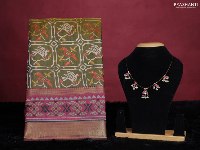 Mehendi green semi tussar saree with matching Neck piece