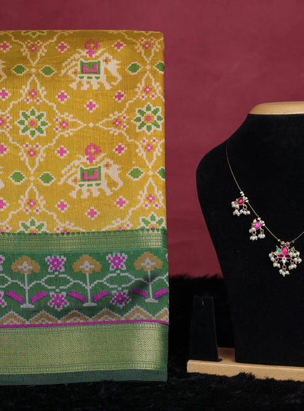 Dark mustard semi tussar saree with matching Neck piece