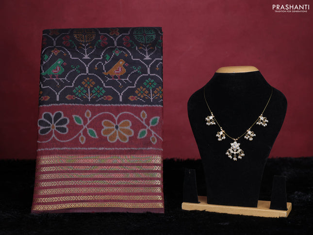Black semi tussar saree with matching Neck piece