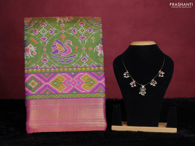 Green semi tussar saree with matching Neck piece