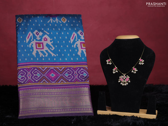 Peacock blue semi tussar saree with matching Neck piece