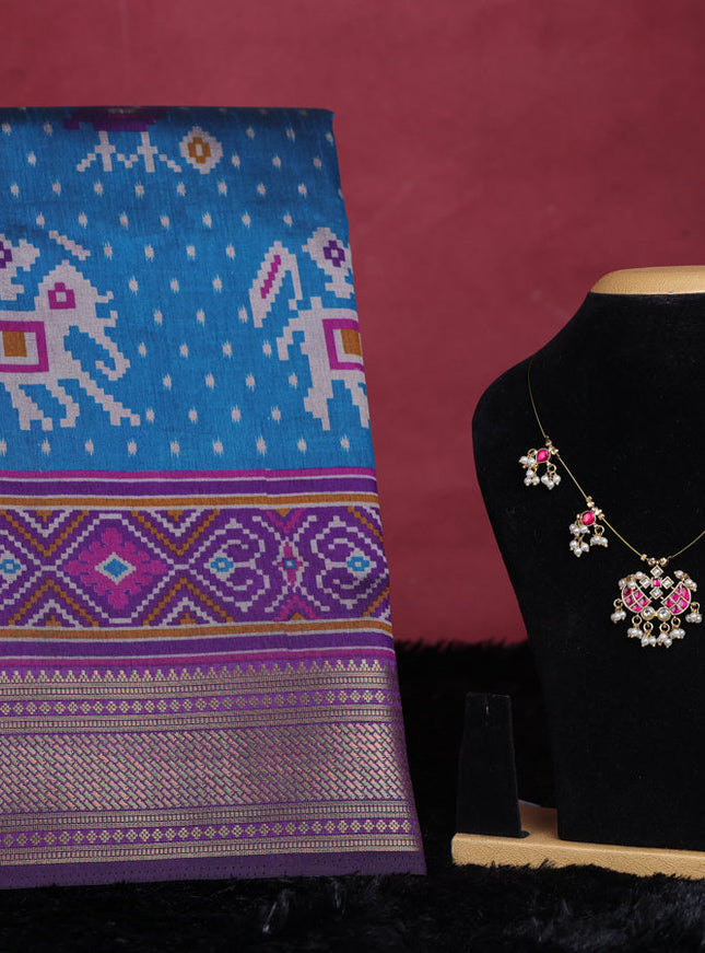Peacock blue semi tussar saree with matching Neck piece
