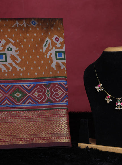 Dark mustard semi tussar saree with matching Neck piece