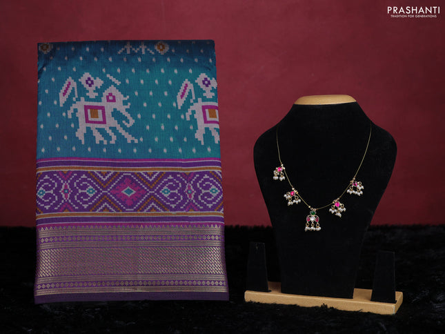Peacock blue semi tussar saree with matching Neck piece