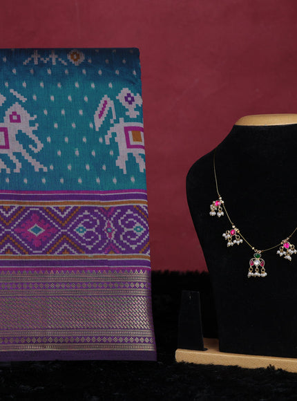 Peacock blue semi tussar saree with matching Neck piece