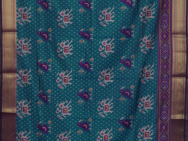Peacock blue semi tussar saree with matching Neck piece