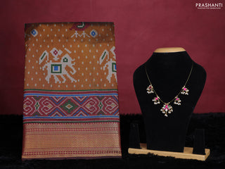 Dark mustard semi tussar saree with matching Neck piece