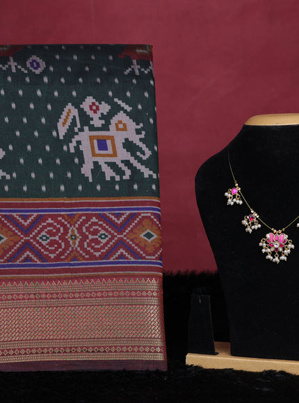 Bottle green semi tussar saree with matching Neck piece