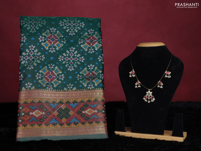 Bottle green semi tussar saree with matching Neck piece