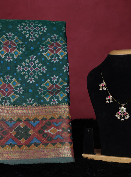 Bottle green semi tussar saree with matching Neck piece