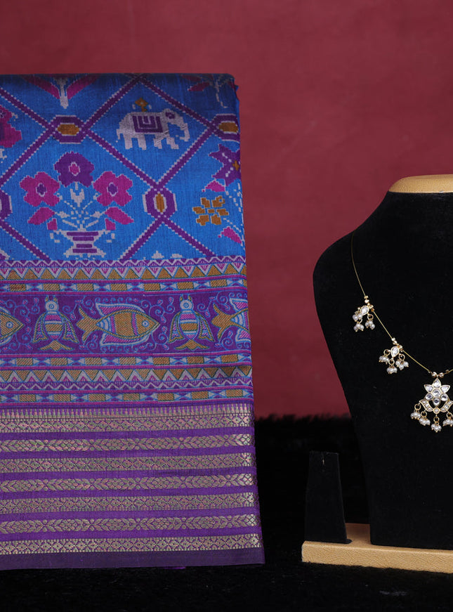 Peacock blue semi tussar saree with matching Neck piece