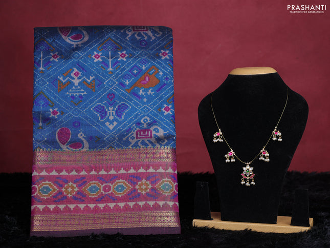 Peacock blue semi tussar saree with matching Neck piece