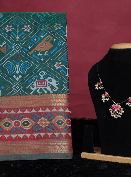 Dark green semi tussar saree with matching Neck piece