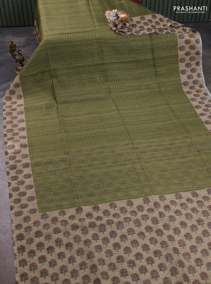 Art chanderi saree sap green and beige with allover checked pattern and printed border