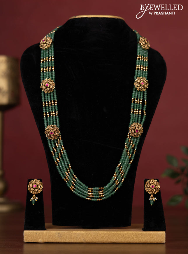 Antique beaded green haaram with side pendant and pink kemp stone