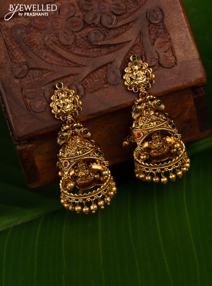 Antique jhumka lakshmi design with kemp stones and golden beads hanging