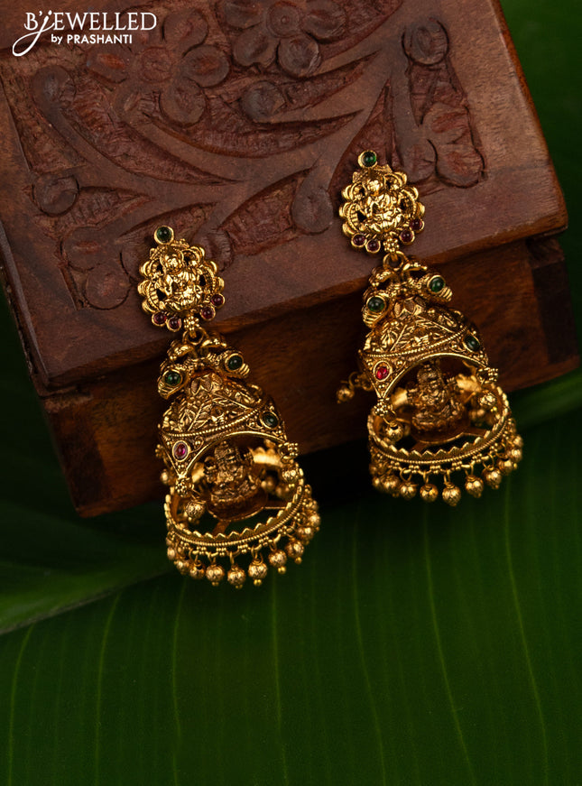 Antique jhumka lakshmi design with kemp stones and golden beads hanging