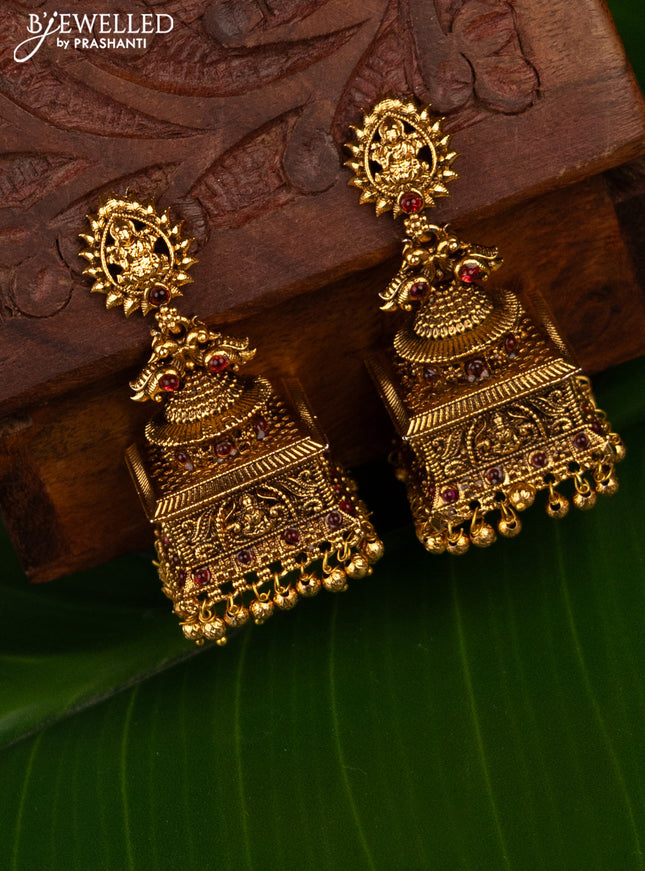 Antique jhumka lakshmi design with pink kemp stones and green beads hanging