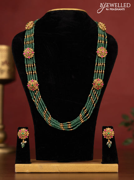 Antique beaded necklace with side pendant and kemp stones