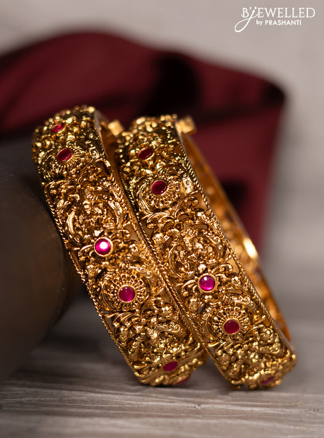 Antique screw type bangle lakshmi design with pink kemp stones