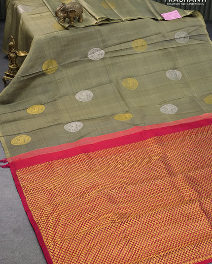 Pure kanjivaram silk saree elaichi green and pink with zari woven buttas in borderless style