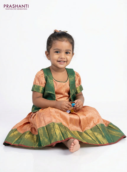 Silk kids frock peach orange and green with allover zari weaves and zari woven border for 3-4 years