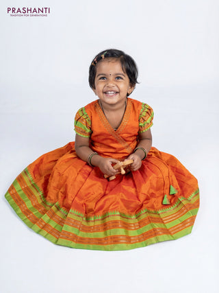 Silk kids lehenga orange with aari work neck pattern and temple design zari woven border for 1-2 years
