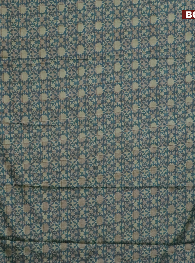 Semi kanchipuram silk saree teal green shade with allover digital prints and zari woven border