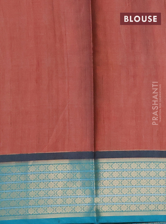 Semi kanchipuram silk saree rust shade and teal green with floral digital prints and zari woven border